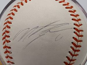 lot 51 image: Miguel Tejada Hand-Signed Baseball with Display JSA Certified