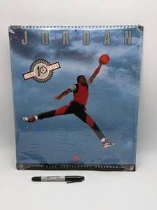 lot 102 image: 1994 Michael Jordan Anniversary Calendar - New in the Original Shrink Wrap