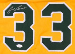 lot 75 image: Jose Canseco Signed Yellow Athletics Jersey