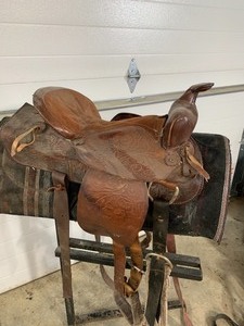 Leather Saddle Older needs oil But Usable