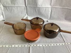 3 Pyrex Saucepans, 2 Covers, and 1 Small Crock