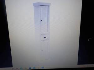 Crosley Tall Linen Cabinet needs a...