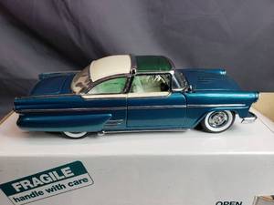 lot 100 image: 1955 Ford Crown Victoria Custom Danbury Mint