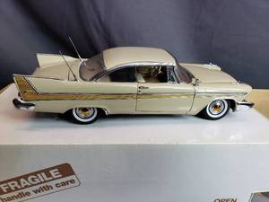 lot 113 image: 1958 Plymouth Fury Danbury Mint