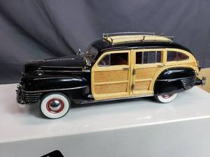 lot 155 image: 1942 Chrysler Town & Country Danbury Mint