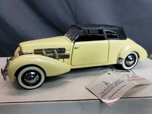 lot 159 image: 1937 Cord 812 Phaeton Coupe Franklin Mint