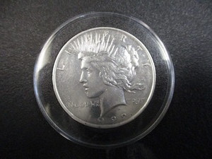 8. 1922-P Silver Peace Dollar in re-openable acrylic protector