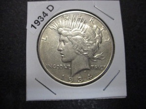 12. 1934-D Silver Peace Dollar - Semi Key Date in re-openable acrylic protector