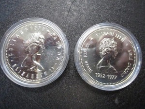 54. (1) 1977 Canadian Silver Dollar Throne of the Senate and (1) 1982 Canadian Silver Dollar Edmonton XI Olympic Games