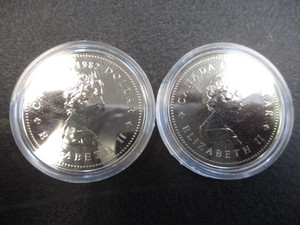 56. Lot of (2) 1867-1982 Confederation Canadian Silver Half  Dollars in Protective Cases.