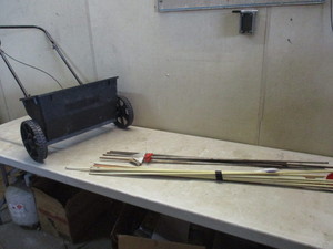 lot 86 image: Garden stakes and seeder and spreader