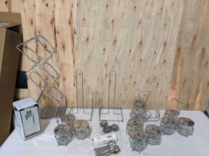lot 367 image: Assortment of Tabletop Accessories Winco Spoons, 3 Hole Wire Condiment Jar Holders, Paper Towel Holders, Napkin Dispenser and More