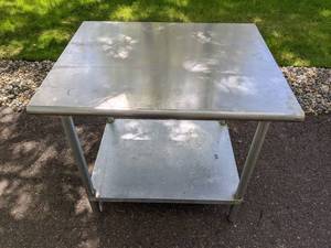 lot 390 image: 30 x 36 Stainless Steel Commercial Work Table with Galvanized Legs and Undershelf
