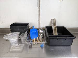 lot 385 image: Assortment of Plastic Serving Containers and Utensils Plastic Food Pan, Polycarbonate Food Pans, Clear Lids, Tongs and More