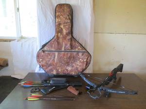 lot 1 image: Horton Tacoma Crossbow Trac 150 with arrows, case and accessories.