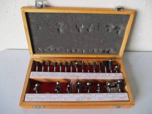 lot 19 image: Woodworking Router Shaper Bits in wood Case. Handyman Toughest.
