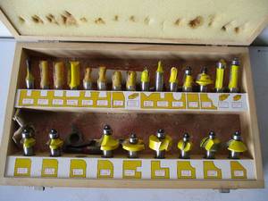lot 21 image: Woodworking Router Shaper Bits in wood Case. Woodtek.