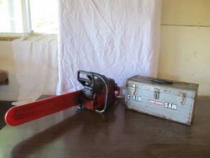 lot 50 image: Lot of Jonsered 2171W Turbo Chain Saw and Accessories in Metal Case.