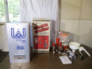 lot 67 image: Lot of Little Chief Electric Smoker NEW in box and No Pro Food Strainer in box.