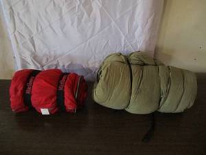 lot 74 image: Lot of 2 Sleeping Bags. One is Marlboro Advertising and one is US Military.