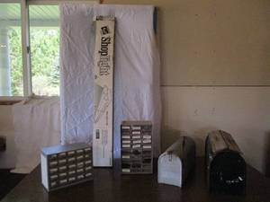 lot 80 image: Lot of Miscellaneous Items Shop Light. Mailboxes. Nut Bolt Cabinets.