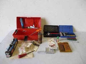 lot 94 image: Lot of 2 Tire Repair Kit in Case and Sharpening Kit.
