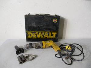 lot 105 image: DeWalt Hammer Drill with parts in Case. Works.