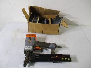 lot 112 image: Paslode Stapler and staples.