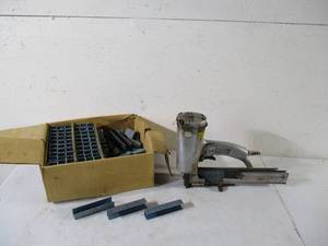 lot 113 image: Paslode Air Stapler and Staples.