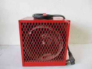 lot 127 image: Marley Electric Company Kerosene Heater. Model 482.