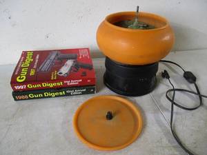 lot 142 image: Brass Polisher for AmmoBrass Casings & Gun Digest Books