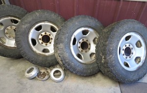 4 GOODYEAR WRANGLER TIRES ON RIMS