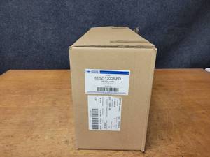 lot 229 image: NOS Genuine Ford Headlight Assembly - Part No. 6E5Z-13008-BD