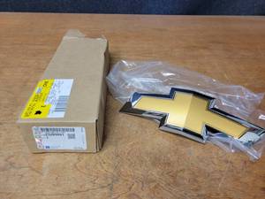 lot 290 image: NEW Genuine GM Chevrolet Bowtie Emblem Part No. 23295091 - Fits 2014-2020 Impala