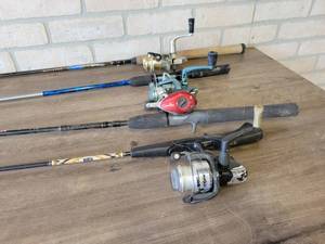 Lot of (4) Fishing Poles and Reels