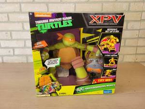 New in Box - Teenage Mutant Ninja Turtle RC Skateboarder - Box is about 15 X 15 X 9