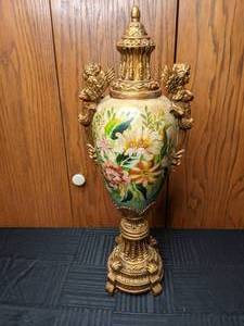 lot 143 image: Floral Urn Featuring Angels on Either Side