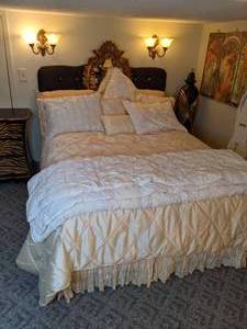 lot 36 image: Stunning Full Size Bed w Padded Headrest & Oval Ornate Mirror, Bedding Set w Throw Pillows