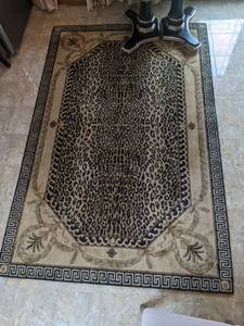 lot 274 image: Patterned Rectangle Carpet with Cheetah Print Accent, 98 x 63