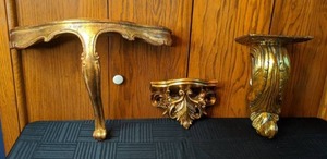 lot 137 image: Trio of 3 Gold Wall Shelves