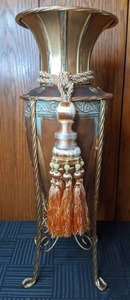 lot 108 image: Large Luxurious Tin Urn in Metal Stand with Large Tassel Adornment
