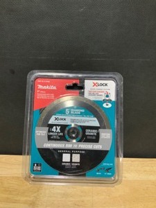 lot 6 image: Makita X-LOCK 5 in. Continuous Rim Diamond Blade for Ceramic and Granite Cutting. See Pictures