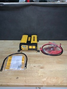 lot 29 image: DEWALT 1000-Watt Portable Car Power Inverter with Triple USB Ports. See Pictures