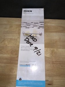 lot 41 image: MOEN Press and Mark 16 in. x 1 in. Concealed Screw Grab Bar with Shelf in Brushed Nickel. See Pictures