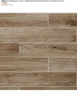 lot 52 image: (28) Cases of Daltile Trace Meadow 6 in. x 36 in. Golden Brown Glazed Porcelain Floor and Wall Tile (14.5 sq. ft.Case). See Pictures