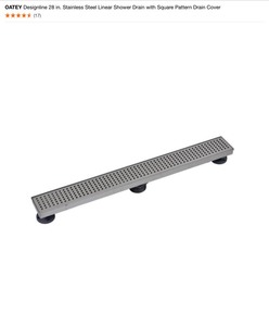 lot 37 image: OATEY Designline 28 in. Stainless Steel Linear Shower Drain with Square Pattern Drain Cover & ALFI BRAND 24 in. Linear Shower Drain in Brushed Stainless Steel. See Pictures