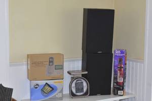 Scale, speakers, fire extinguisher and phone