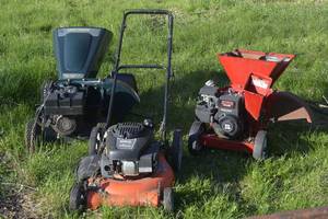 lot 27 image: 2 wood chippers and a lawn mower