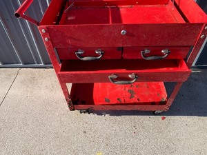 old red Rusty Tool Box