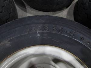 lot 83 image: (4) 18 x 18.50 - 8 Tires on 4 Bolt Rims
